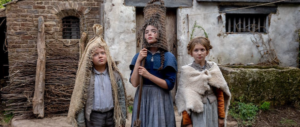 Children performing play form Hamnet” style=