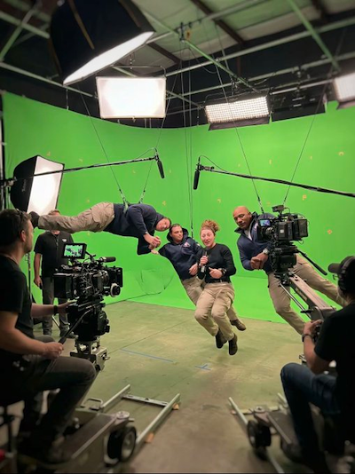 Artemis II crew hanging from harnesses